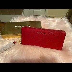 Red Michael Kors wristlet wallet